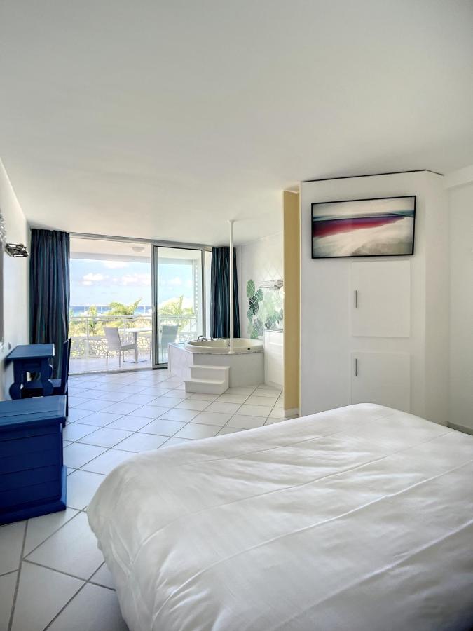 Le Domaine Anse Marcel Beach Resort Экстерьер фото