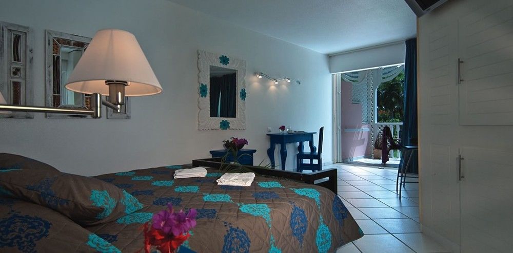 Le Domaine Anse Marcel Beach Resort Экстерьер фото